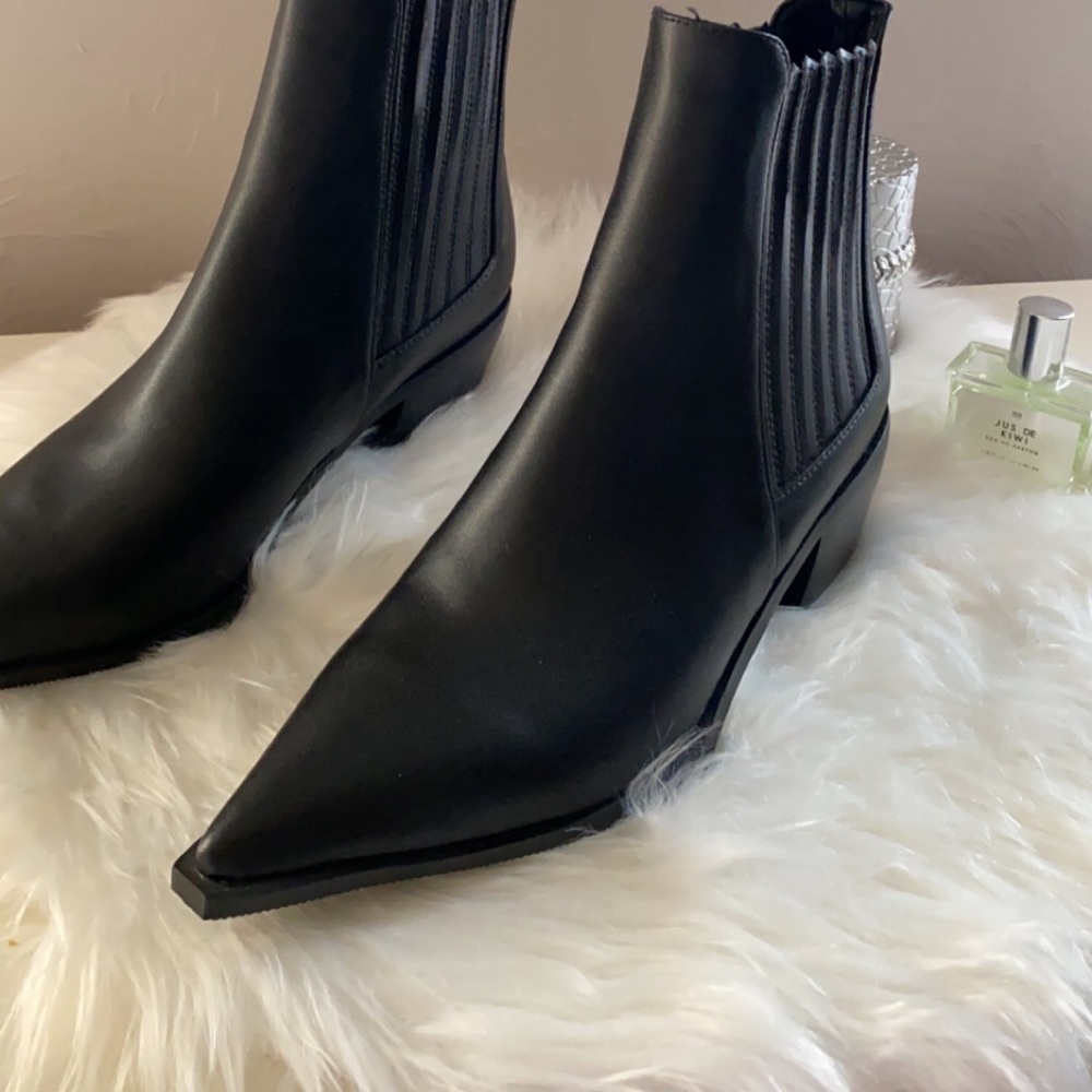 Pointed black boots